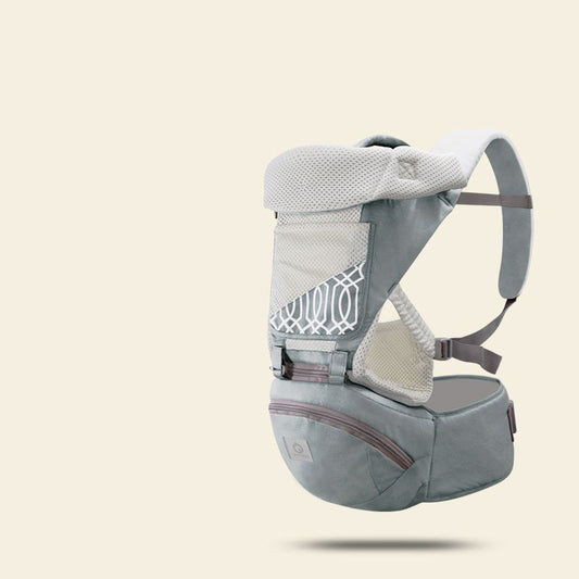 Ergonomic gray baby carrier with breathable mesh, hip seat, and patterned front panel.