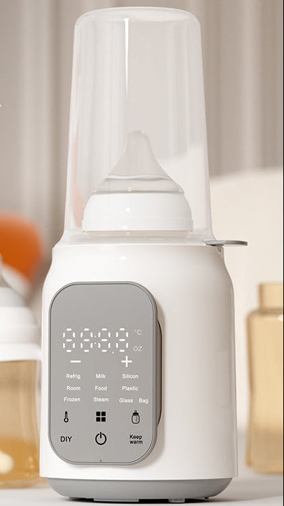 White electric baby bottle warmer with digital touch screen, clear lid, and a bottle inside.