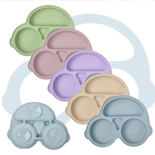 Colorful silicone car-shaped plates with vacuum bases for self-feeding babies.