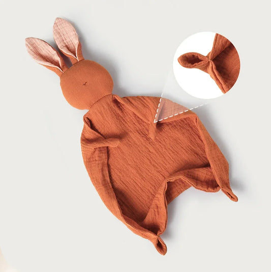 Soft orange muslin cotton baby security blanket with cute bunny head and long ears.