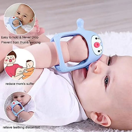 Blue silicone ergonomic baby teether pacifier worn on a baby's hand, with feature callouts.