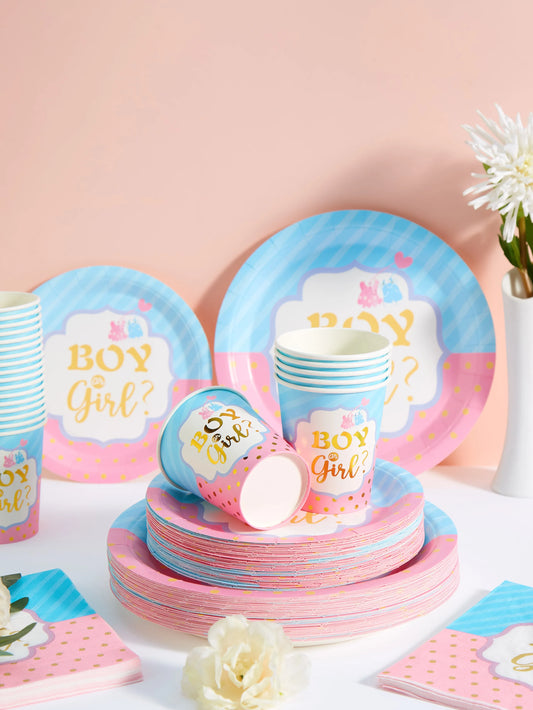 Pink and blue disposable party tableware for a gender reveal, featuring "Boy or Girl?" text on plates, cups, and napkins.