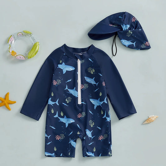 Navy long-sleeve rash guard swimsuit for babies 0-5 years with shark print and matching sun hat.