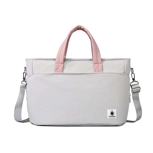 Light gray insulated diaper bag with pink handles, shoulder strap, and a small cat logo.