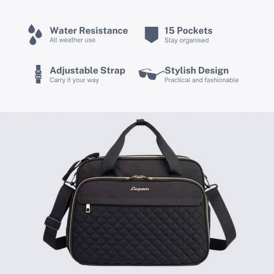 Black quilted waterproof diaper bag with gold zippers, adjustable strap, and top handles.