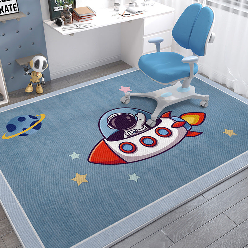 Blue crystal velvet kids' rug with a cartoon astronaut in a rocket, planets, and stars.