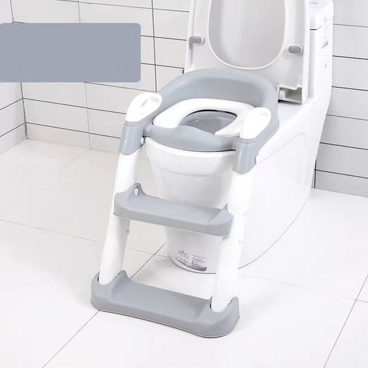 מושב אסלה לילדים עם מדרגות בטיחותי וריפוד נוח