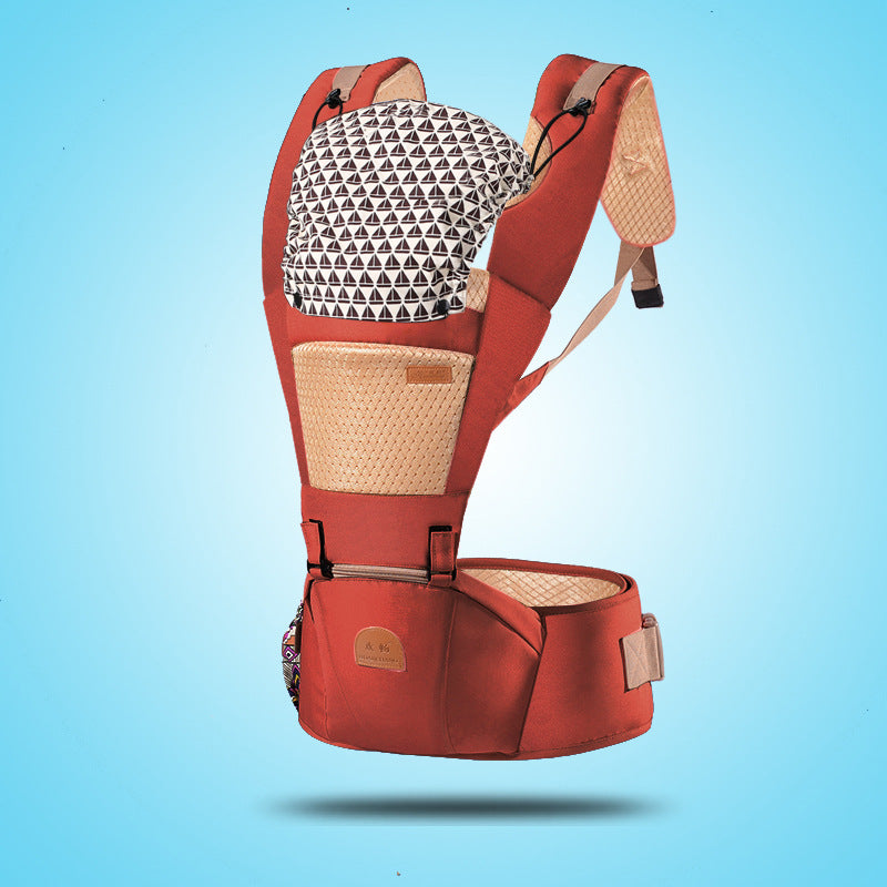 Ergonomic red baby carrier with patterned headrest, breathable mesh, and adjustable straps for shoulder and back support.