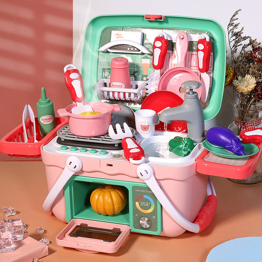 Pink and green portable kids' play kitchen with sink, stove, oven, and various toy utensils.