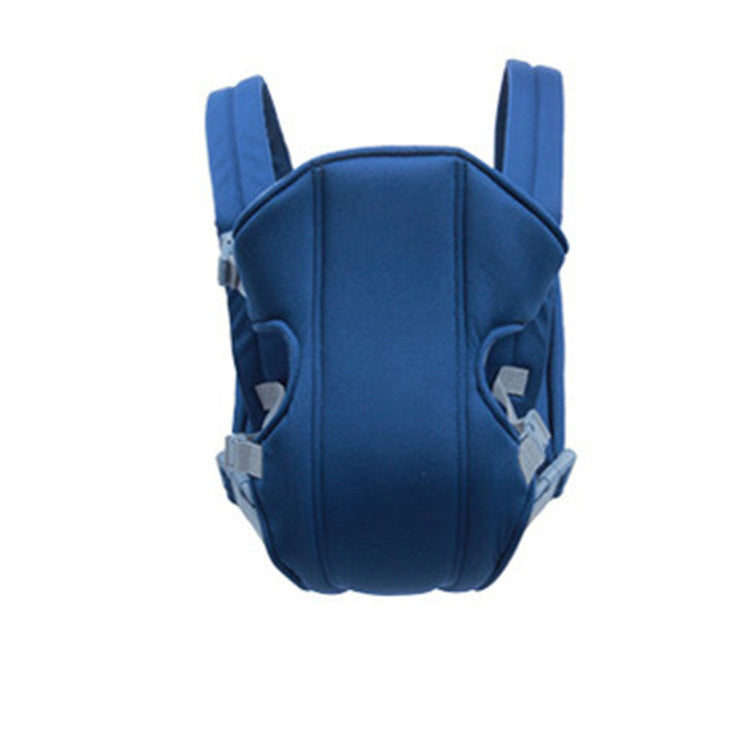 Dark blue ergonomic baby carrier with padded shoulder straps and waist seat.