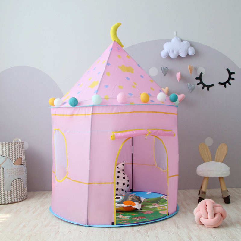 Pink polyester kids' play tent with yellow moon, stars, and colorful pom-poms.