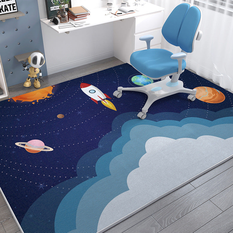 Soft crystal velvet kids' rug with a blue space and cloud design, featuring planets and a rocket.