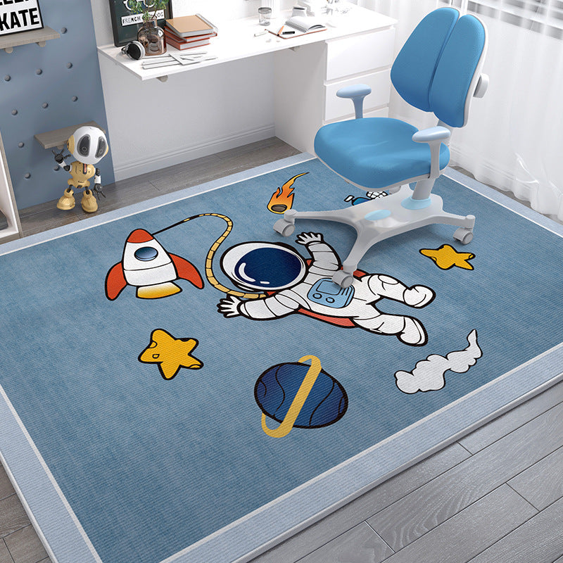 Soft blue crystal velvet kids' rug with astronaut, rocket, and planet cartoon designs.