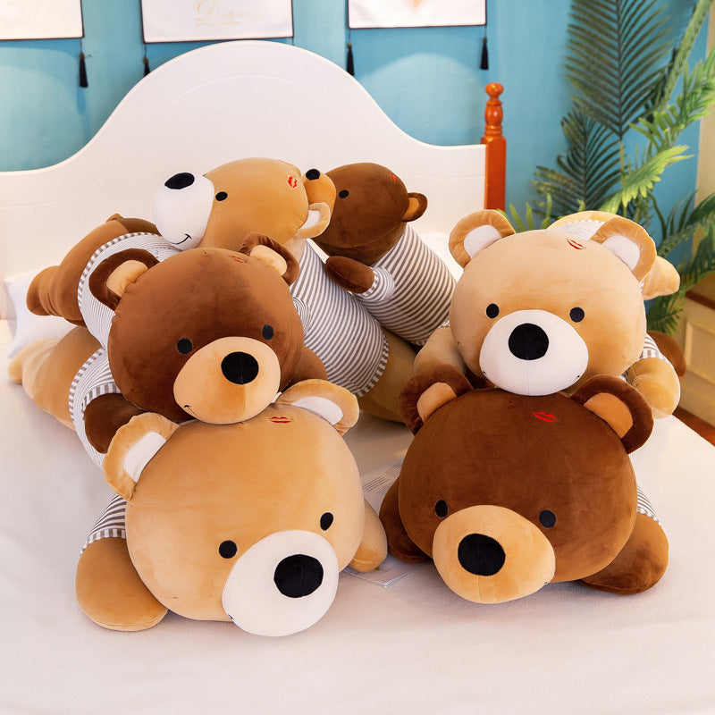 Soft, plush 60cm lying teddy bears in light and dark brown with striped shirts, on a white bed.