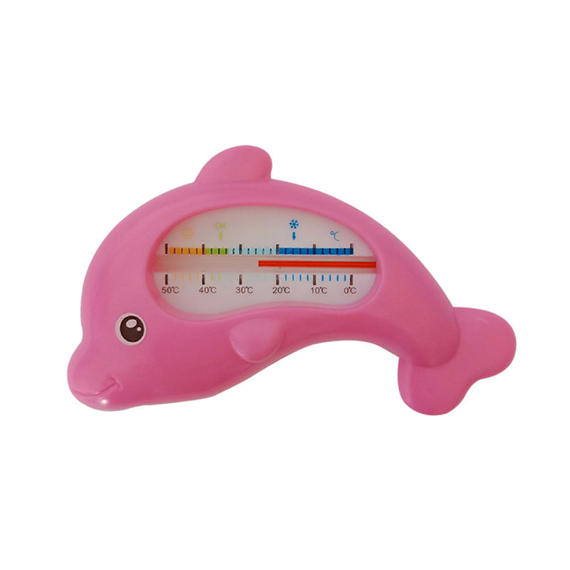 Pink dolphin-shaped baby bath water thermometer with clear temperature scale.