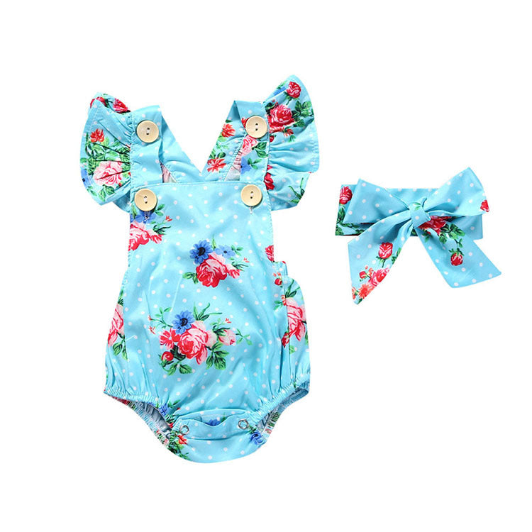 Blue chiffon sleeveless baby romper with floral print, polka dots, wooden buttons, and matching bow headband.