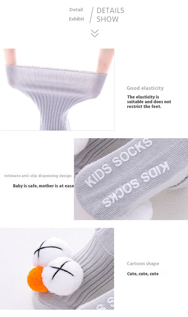 Gray ribbed cotton baby socks with good elasticity, anti-slip soles, and cute cartoon pom-pom details.