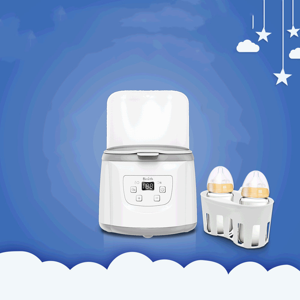 White dual baby bottle warmer and sterilizer with digital display, next to a basket holding two bottles.