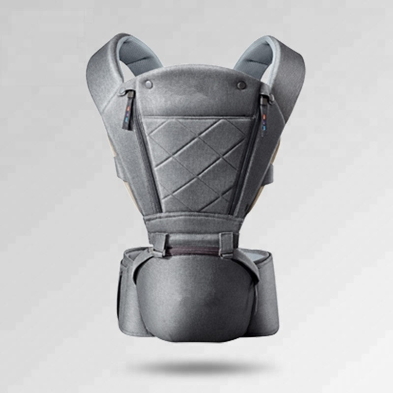Ergonomic gray hip seat baby carrier with breathable fabric, padded straps, and quilted front panel.