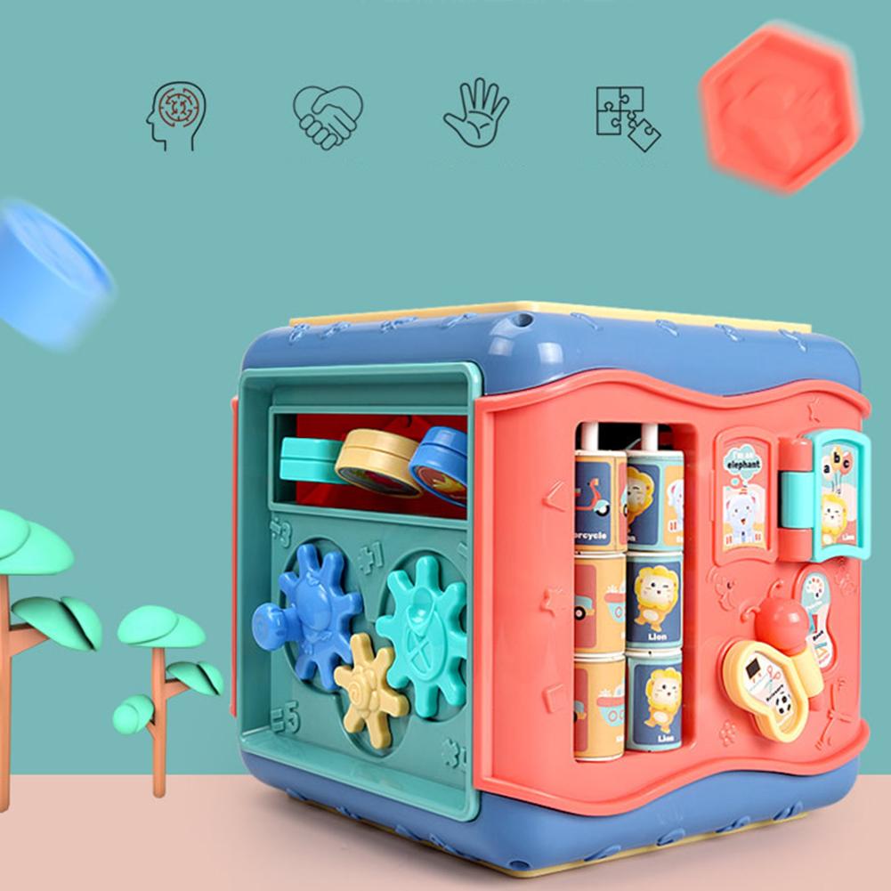 Montessori hexagonal activity cube for babies, with gears, animal pictures, and shape sorters in blue and orange.