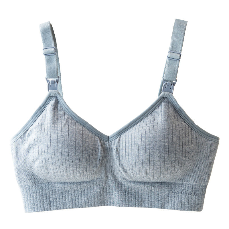 Light blue ribbed wireless nursing bra with adjustable straps and clasps for easy feeding.