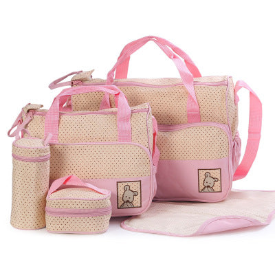 Pink and beige 5-piece multi-functional diaper bag set with polka dots and bear embroidery.