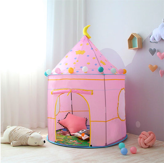 Pink polyester children's play castle tent with stars, moon, colorful pom-poms, and window openings.