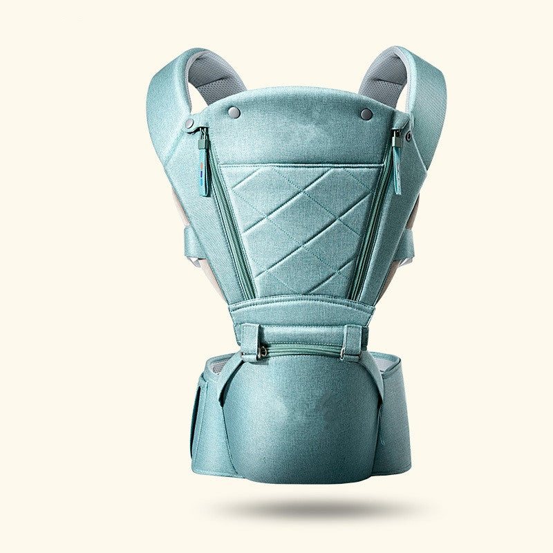 Ergonomic light blue baby hip seat carrier with quilted front, breathable fabric, and padded straps.