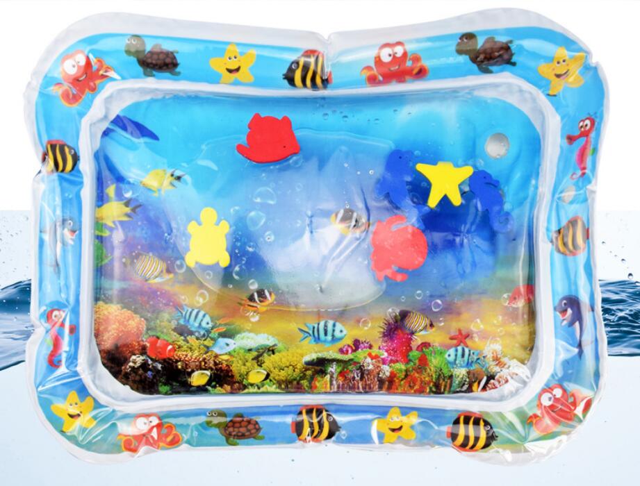 Inflatable baby water play mat with colorful floating sea creatures and an underwater scene.