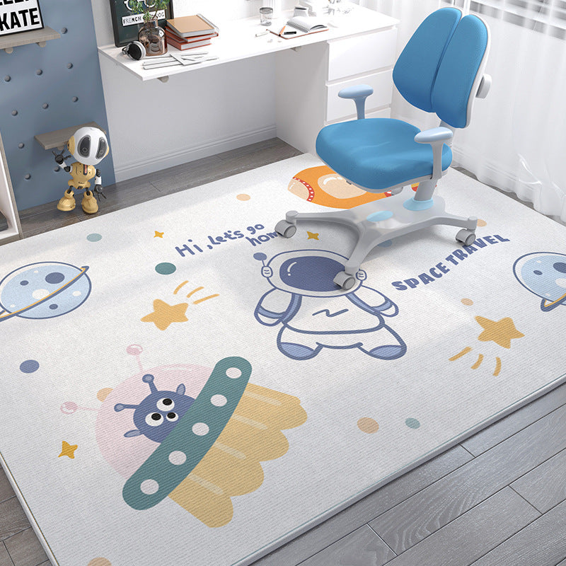 Soft crystal velvet kids' rug with cartoon space travel design, featuring astronauts and planets.