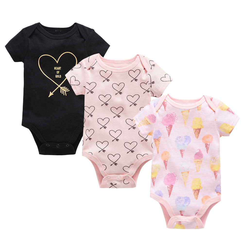 Three soft cotton baby bodysuits: black with a gold heart, pink with heart arrows, and pink with ice cream cones.