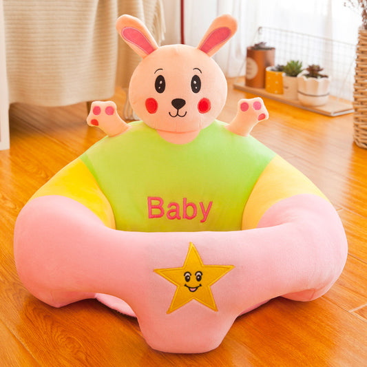 Plush pink and green baby support seat with a cute bunny design and "Baby" embroidered on the front.