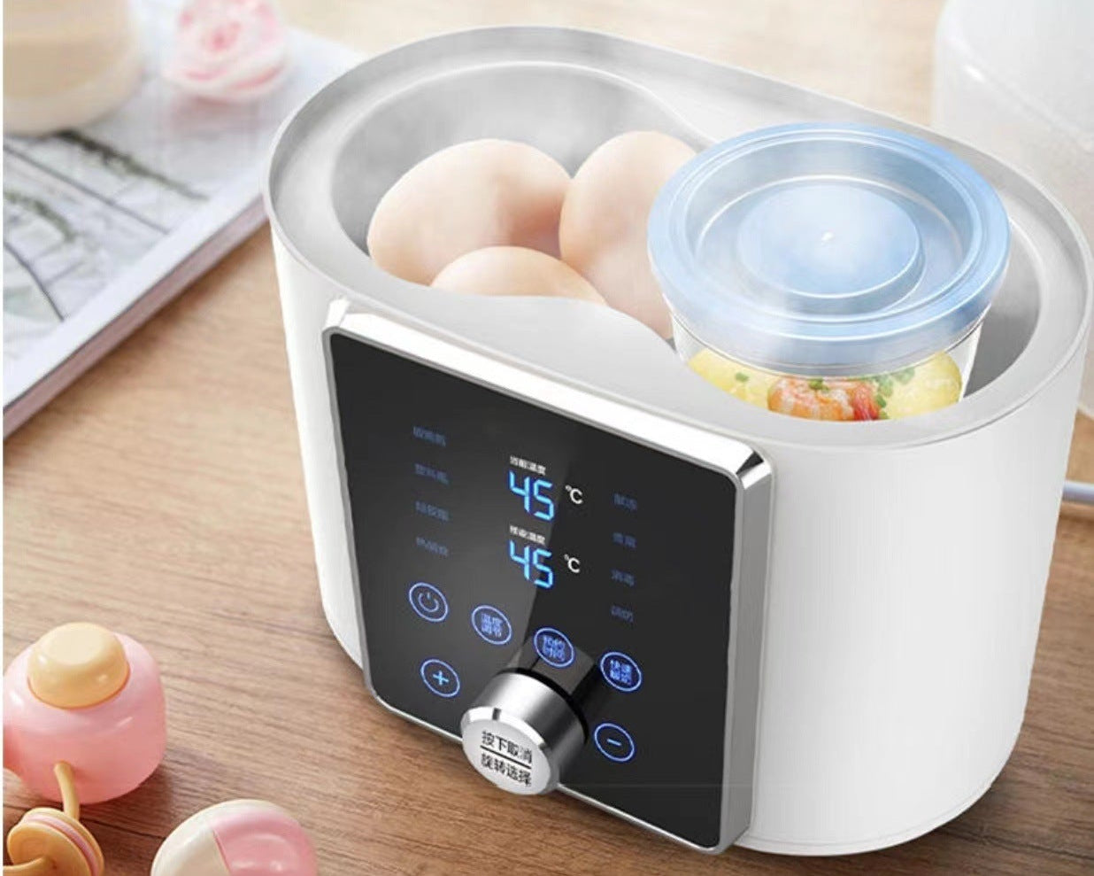 White smart baby bottle warmer with digital display, heating eggs and baby food.
