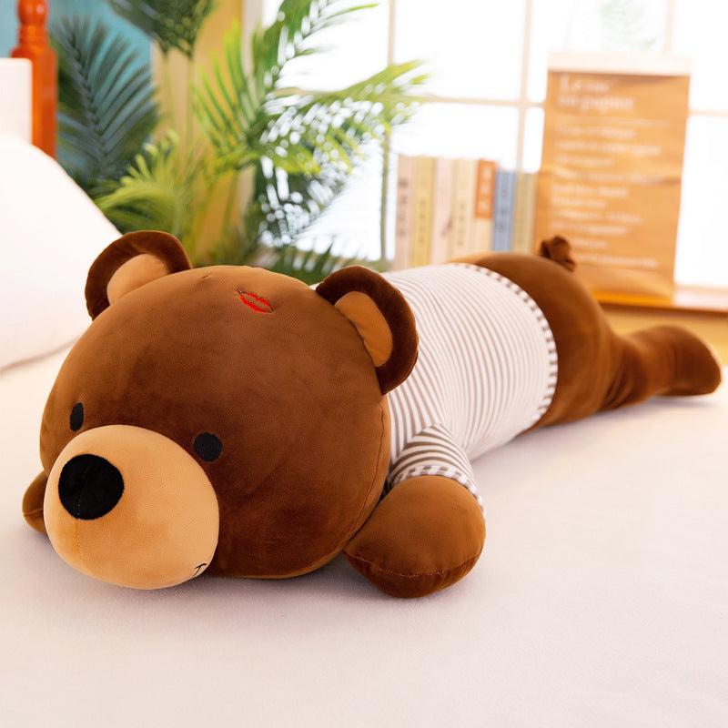 Soft brown plush teddy bear, 60cm, wearing a striped shirt, lying down with a red kiss mark.
