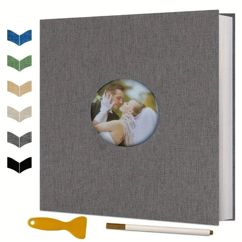 Gray linen photo album with a circular cover window displaying a couple, alongside color swatches and accessories.