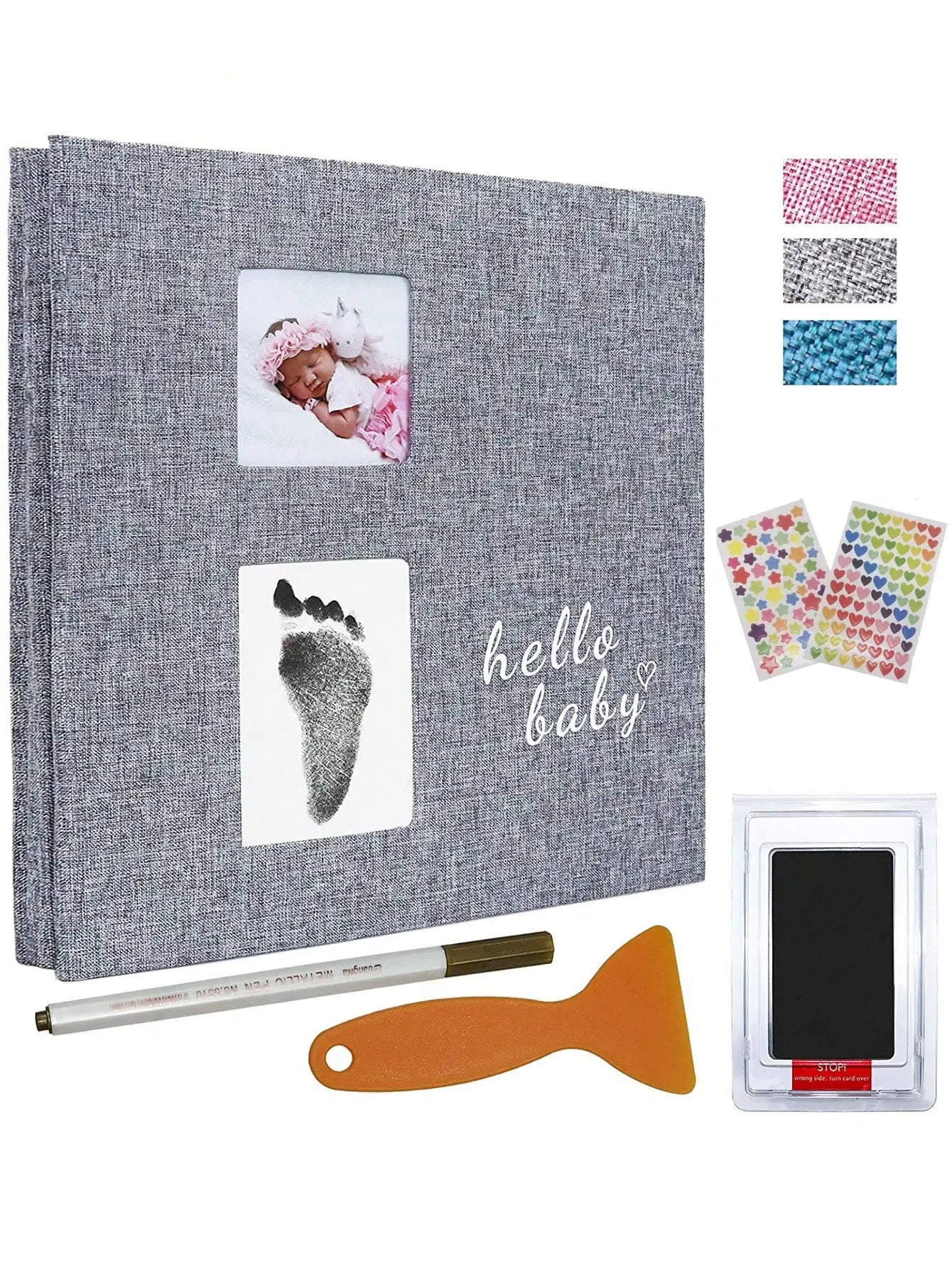Gray linen baby photo album with footprint kit, metallic pen, and decorative stickers.
