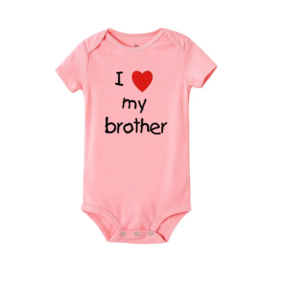 Pink short-sleeve baby romper with "I love my brother" print, soft polyester, unisex design.
