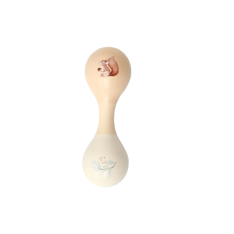 Natural wood Montessori baby rattle with a squirrel and leaf design.
