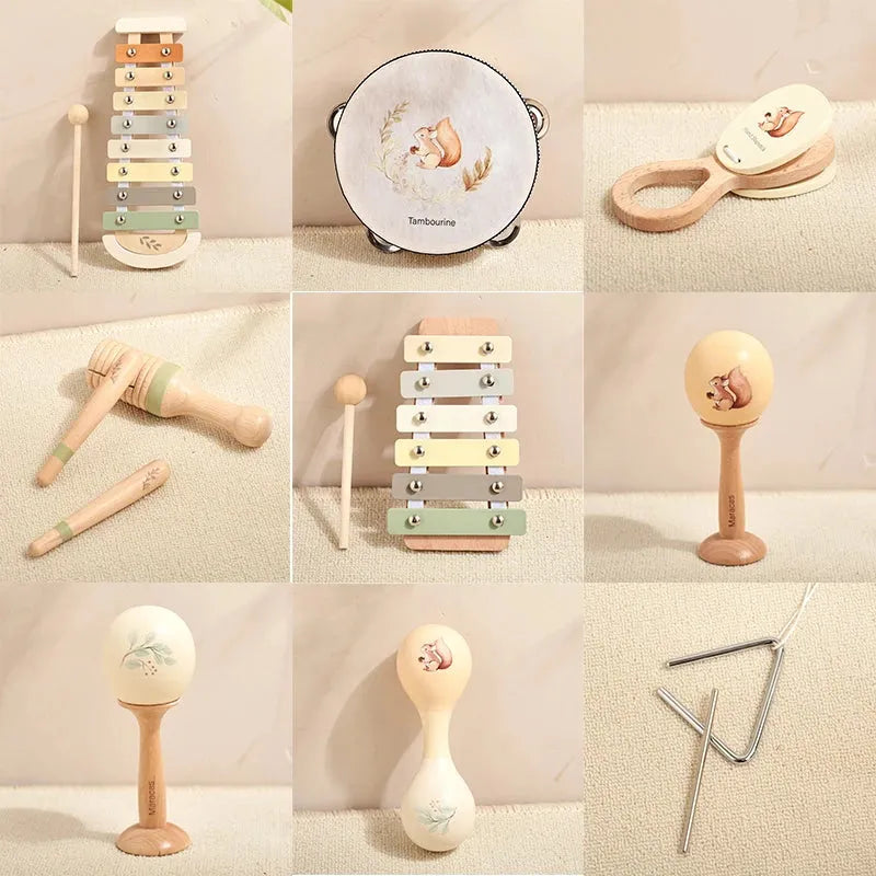 Montessori wooden musical instrument set for babies and toddlers, featuring a xylophone, tambourine, maracas, and clappers.