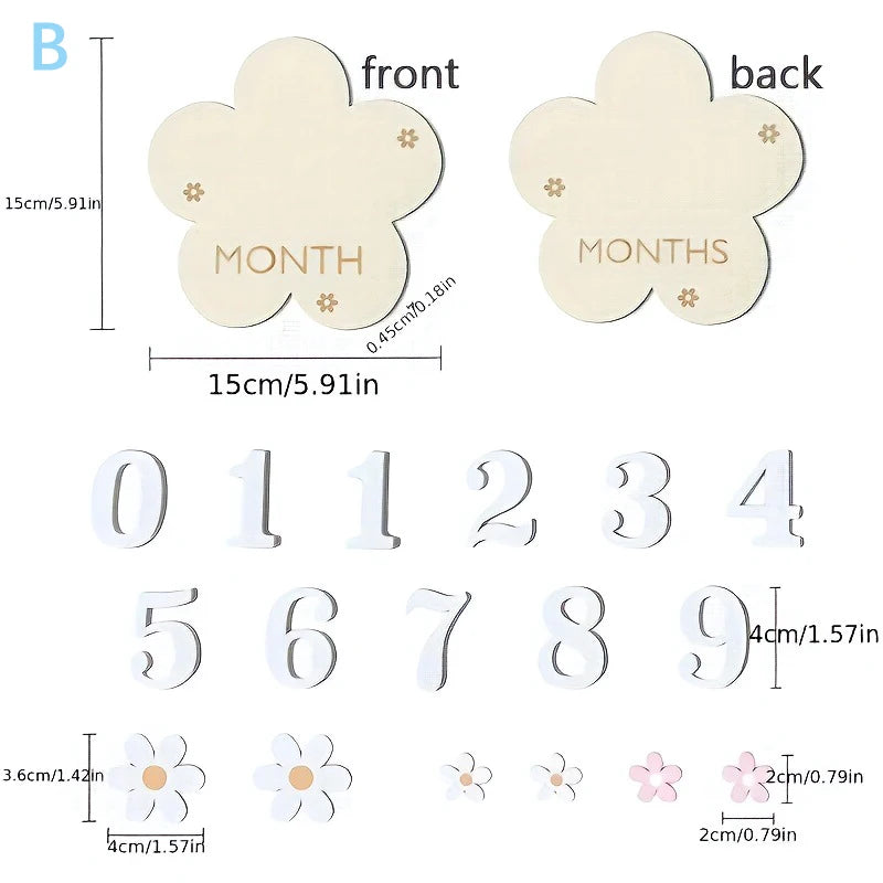 Wooden baby milestone cards with "MONTH" and "MONTHS" engravings, numbers 0-9, and flower accents.