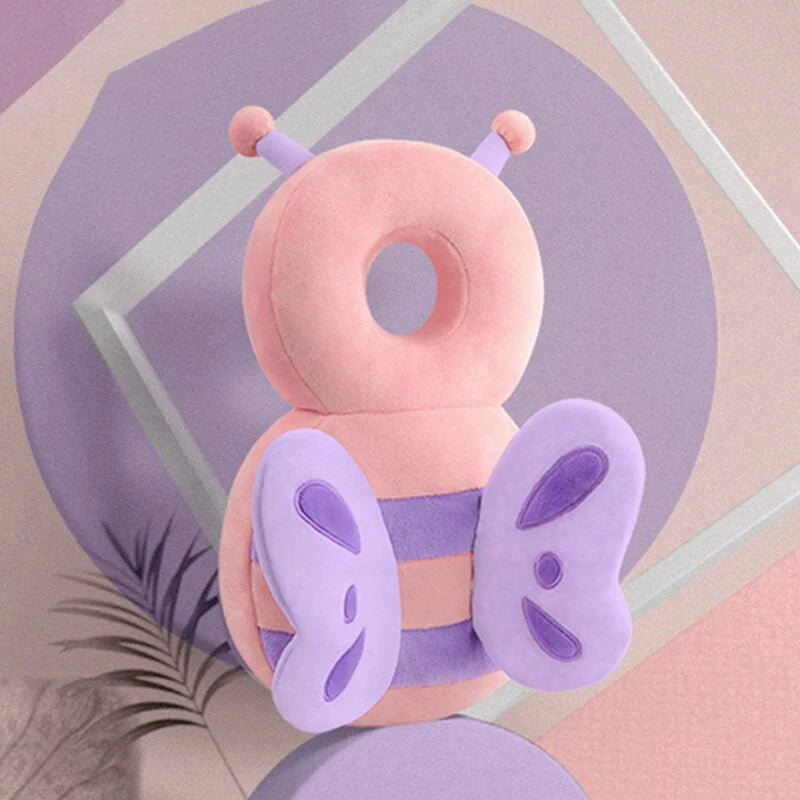 Pink and purple bee-shaped baby head protection pillow with soft padding and wings.