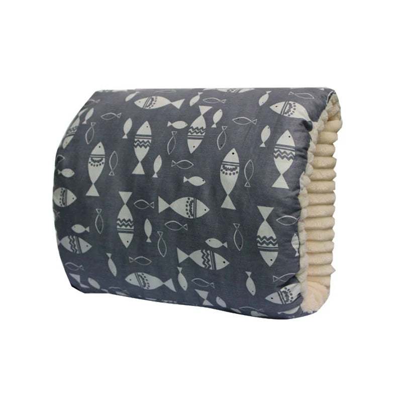 Gray nursing pillow with white fish pattern and soft beige ribbed underside.