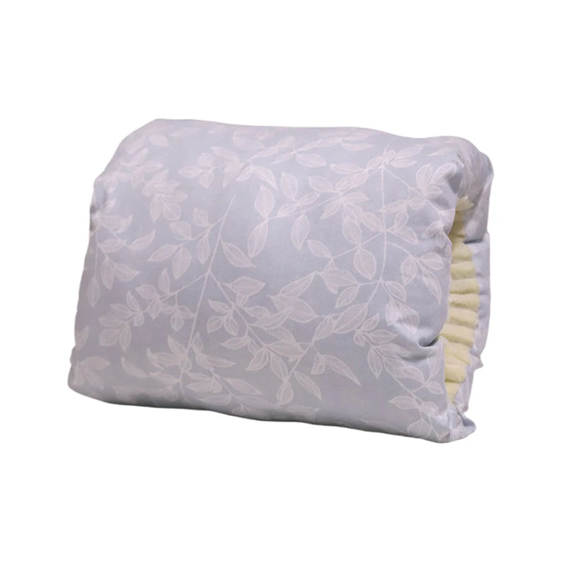 Light blue cotton nursing pillow with white leaf pattern, designed for arm support.
