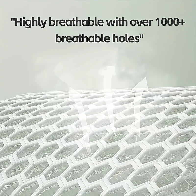 Close-up of white, breathable polyester fabric with a honeycomb pattern, showing air circulation.