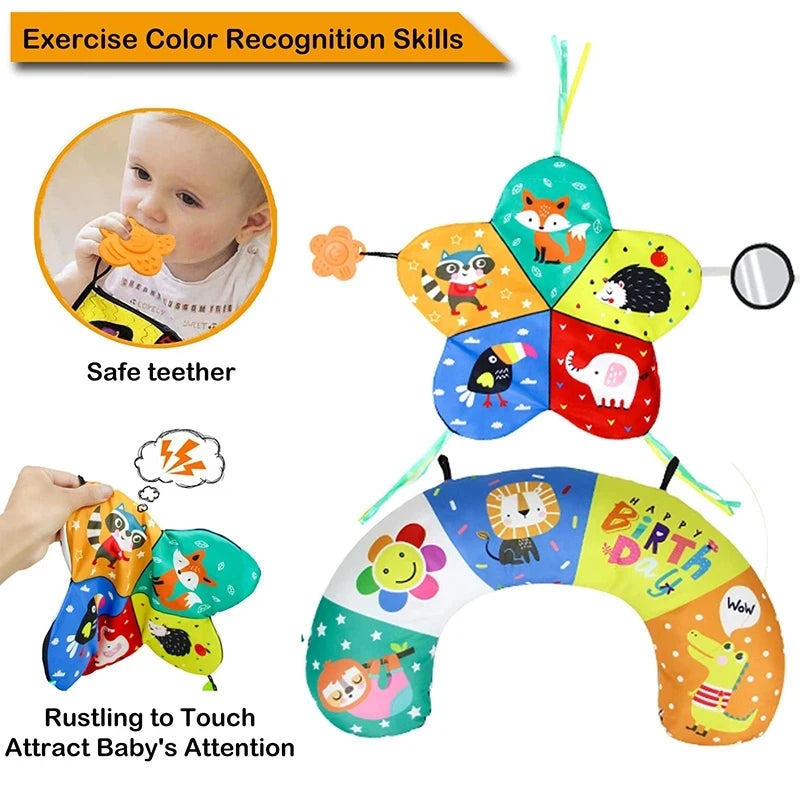Colorful baby tummy time pillow with animal designs, teether, and mirror for sensory development.