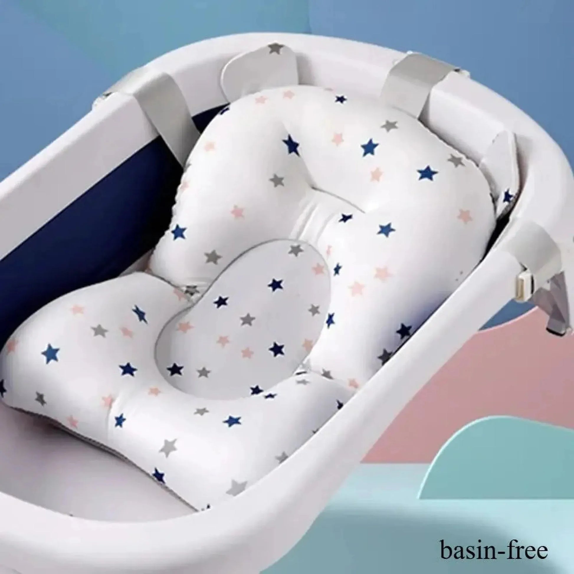 White baby bath support cushion with colorful stars, adjustable straps, in a white bathtub.