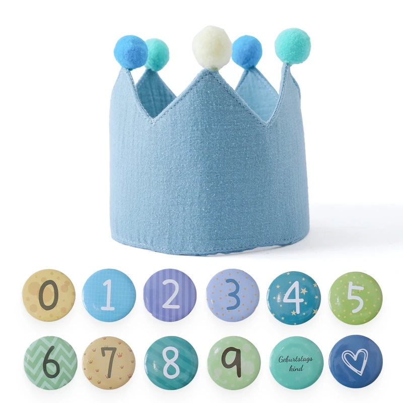 Light blue cotton baby birthday crown with colorful pom-poms and interchangeable number pins 0-9.