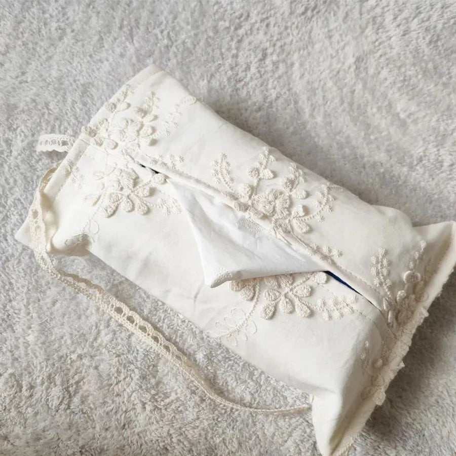 White French lace tissue box cover with delicate floral embroidery and hanging strap.