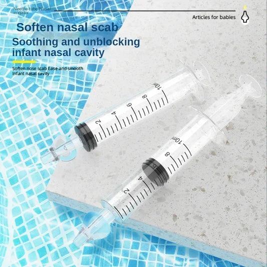Two clear 10ml baby nasal aspirator syringes with soft silicone tips, on a white surface.