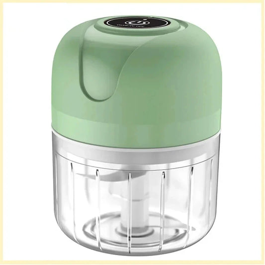 Green and clear mini rechargeable electric food chopper with stainless steel blades.